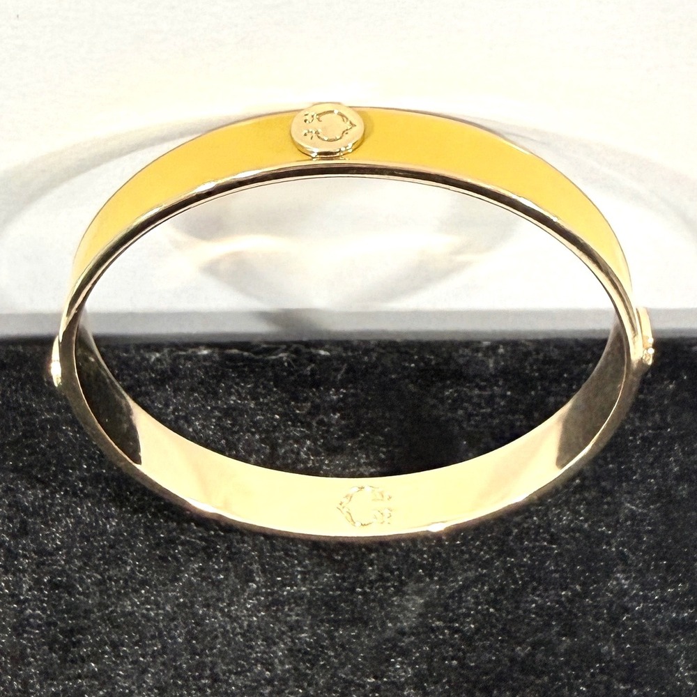 C. Wonder Enamel Bangle Bracelet Women Yellow Gold Tone Slip On Logo Jewelry
